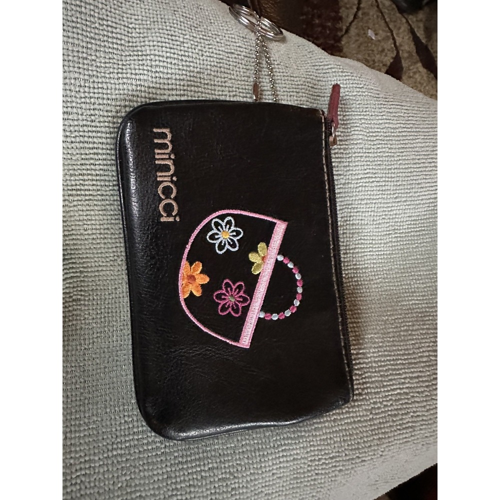 black faux-leather Minicci coin purse